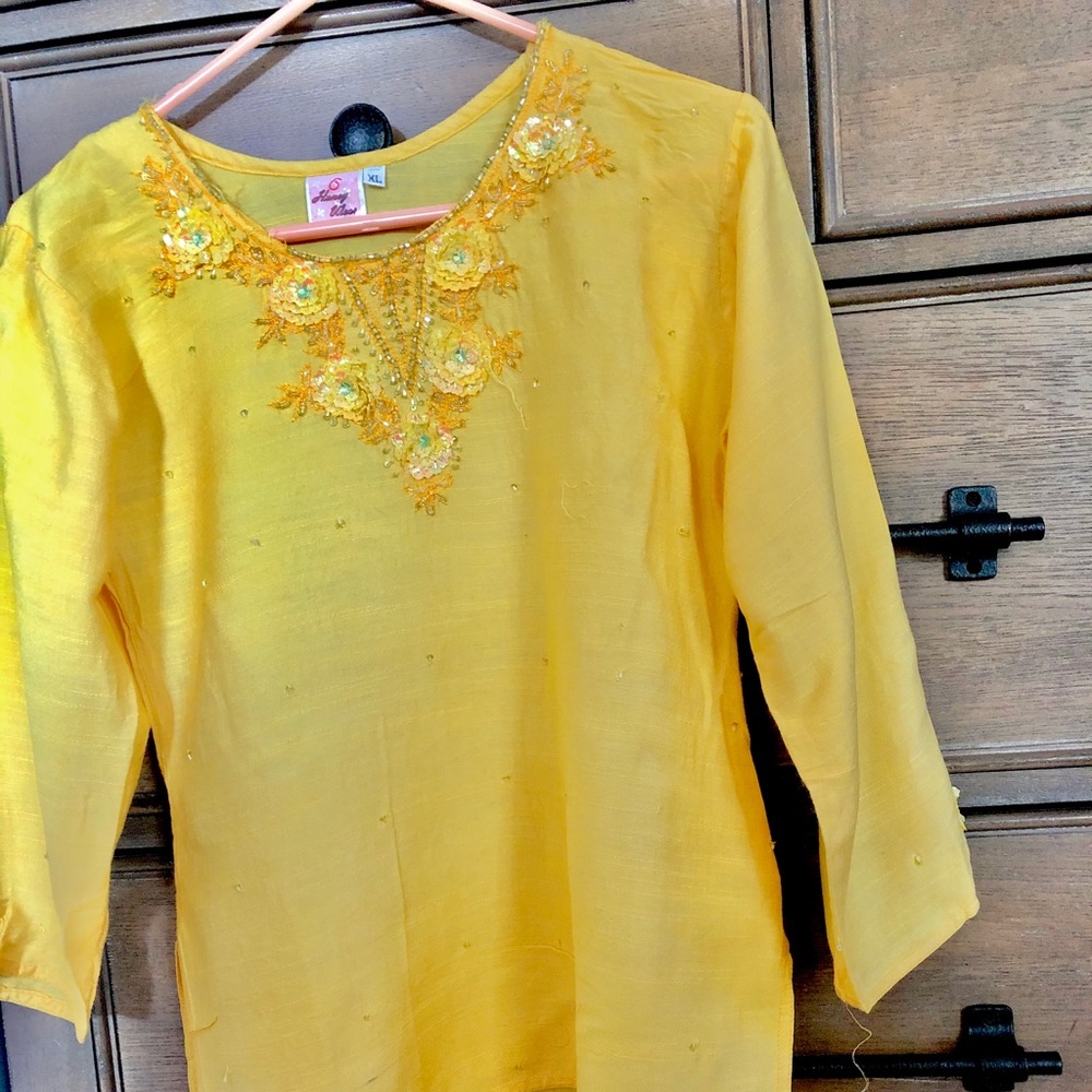 Beautiful sequenced top.